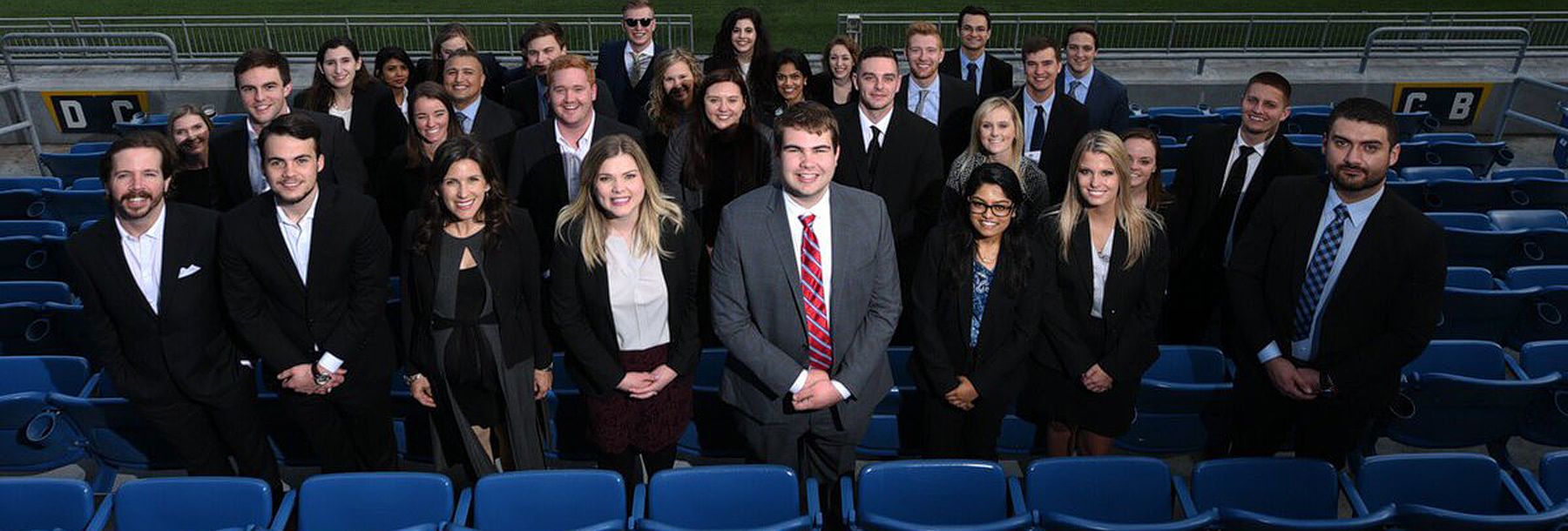 Section Image: MBA students in bleachers 