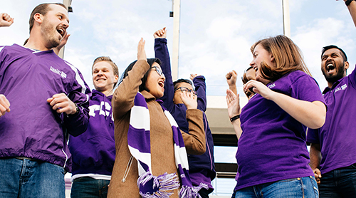 Section Image: MBA students in the BLUU arch 