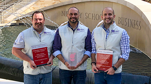 Section Image: Matt Smilor, Rodney D'Souza and Antonio Banos with GCEC awards in front of the Neeley fountain 
