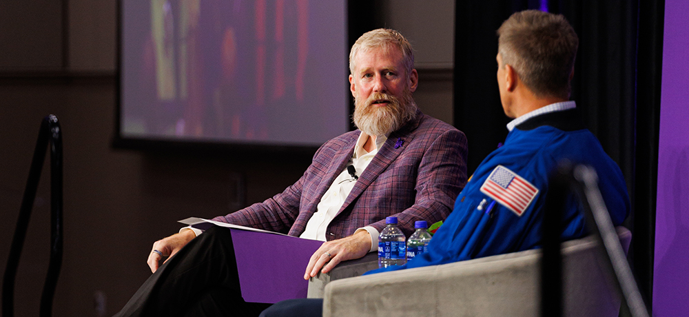 Section Image: Chris Cassidy and Craig Crossland on stage in the BLUU ballroom 