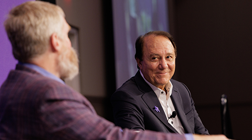 Jim Keyes and Craig Crossland on the stage in the BLUU ballroom 