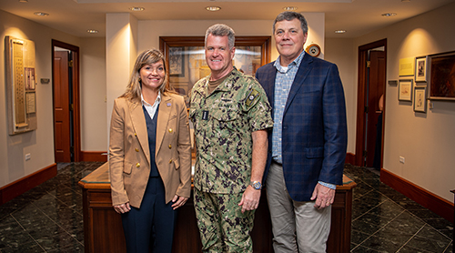 Section Image: Ann Bluntzer and Energy MBA candidate Pete Baldwin with Admiral Samuel Paparo, Commander, U.S. Pacific Fleet, during the institute's trip to deliver findings on the Pacific Islands Energy Initiative. 