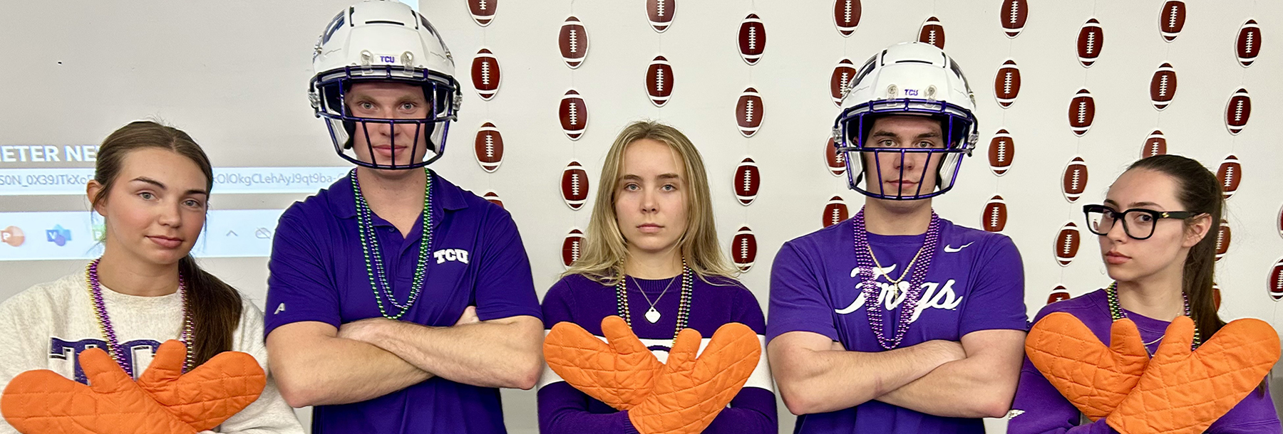 Section Image: TCU students with helmets and mitts 