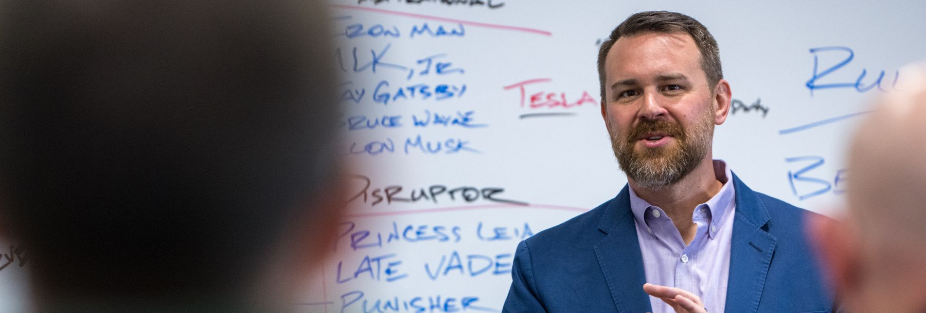 Section Image: Eric Harris presenting to an ExecEd class 