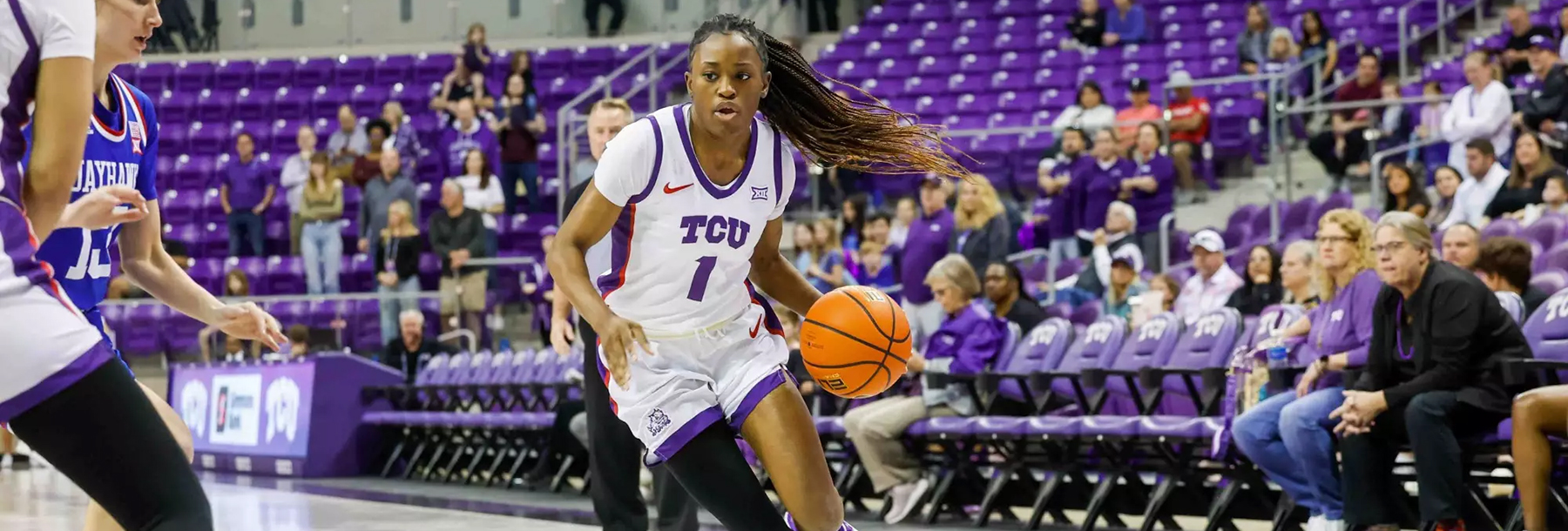 Section Image: Tomi Taiwo playing basketball for TCU 