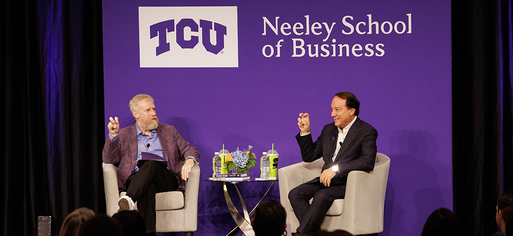 Section Image: Jim Keyes and Craig Crossland on the stage in the BLUU ballroom 