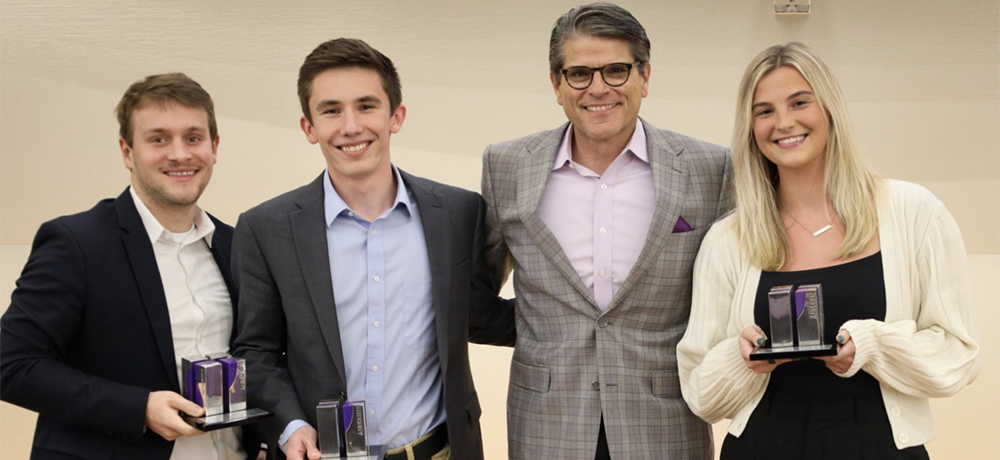 Matej, Michael, Steve and Lilly pose with awards