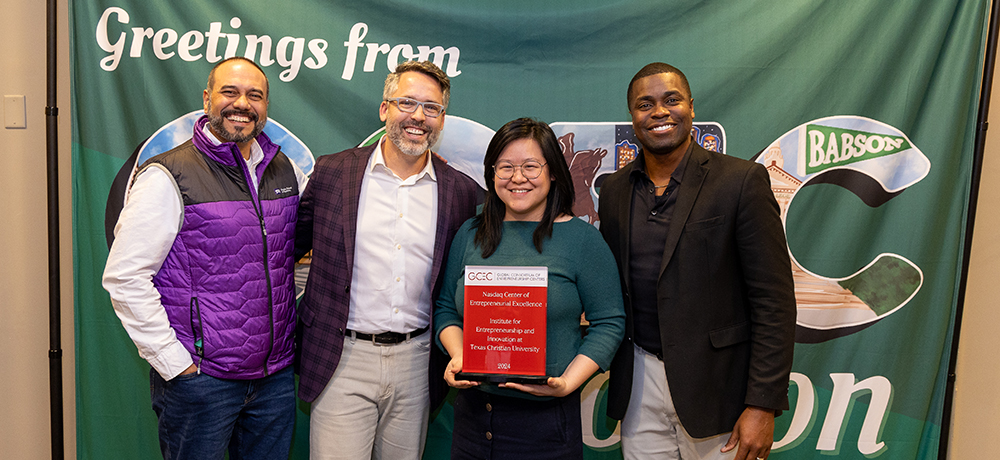 Rodney D'Souza, Paul Evans, Lianne Yang and Cedric James with award