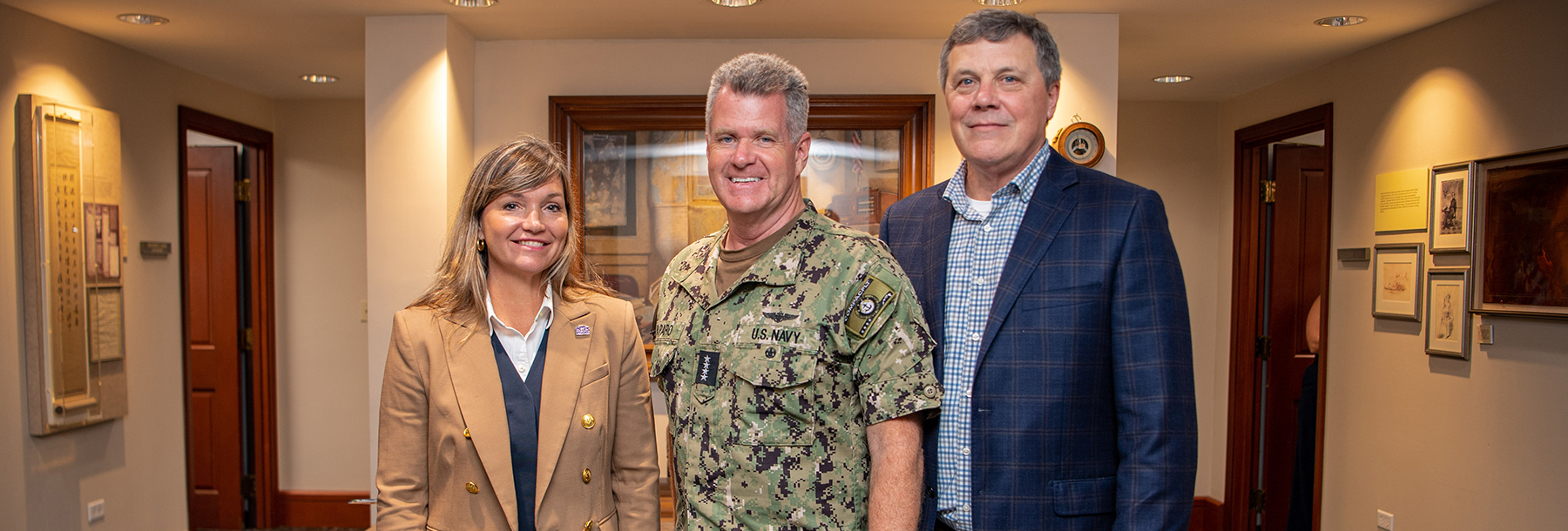 Section Image: Ann Bluntzer and Energy MBA candidate Pete Baldwin with Admiral Samuel Paparo, Commander, U.S. Pacific Fleet, during the institute's trip to deliver findings on the Pacific Islands Energy Initiative. 