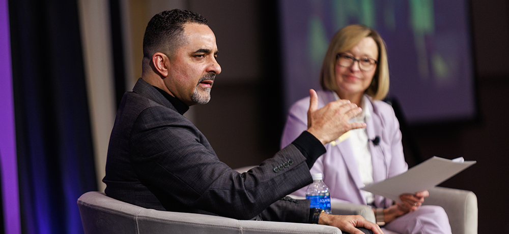 Randy Parker and Hettie Richardson on stage at the TESS event